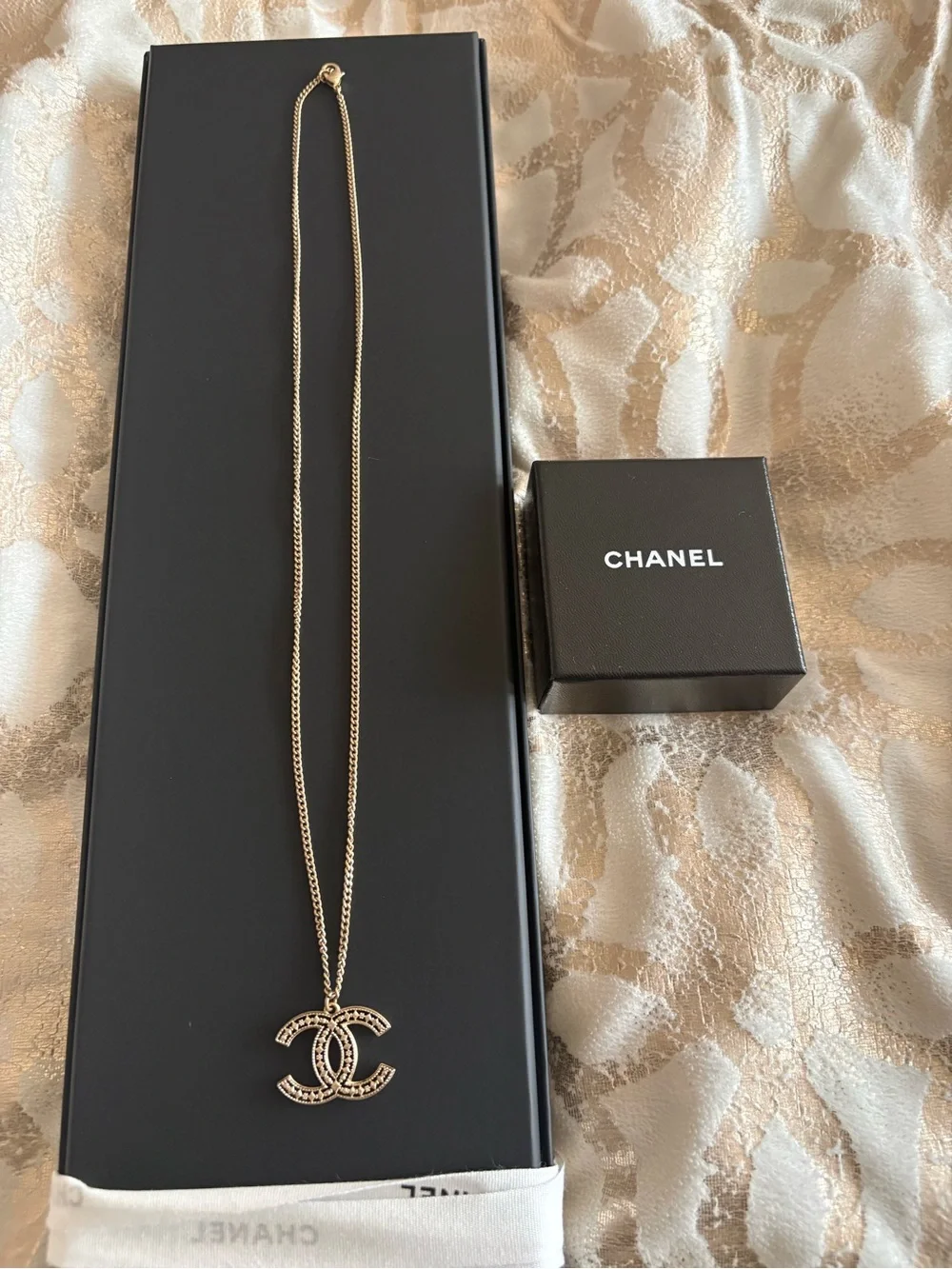 CHANEL Gold-Tone Interlaced CC Pendant Necklace